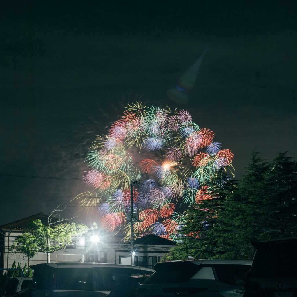 A firework display in the night sky